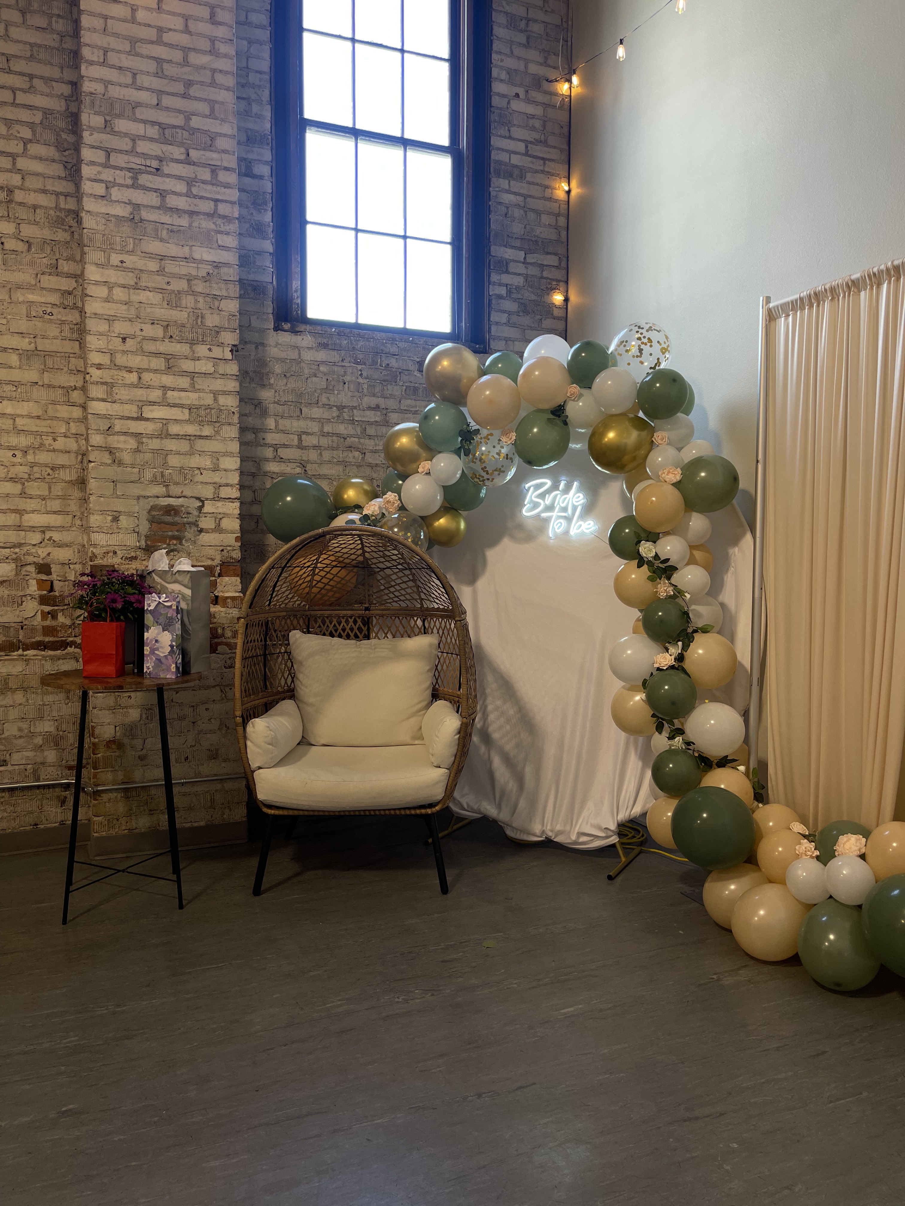 Bride To Be neon sign with balloon arch at Host Wenatchee bridal shower venue