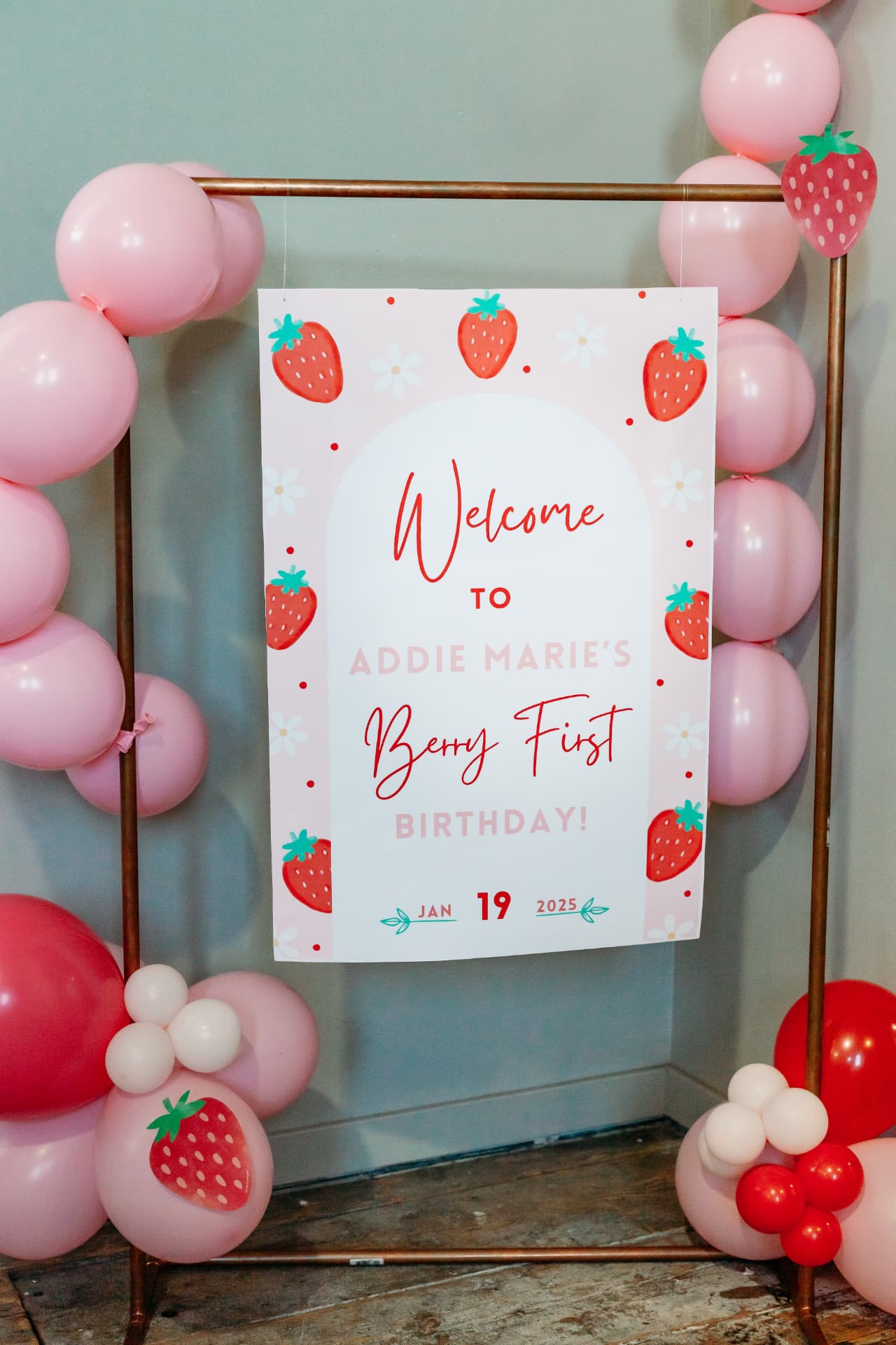 Welcome sign with balloon garland at the entrance of a party at Host Wenatchee